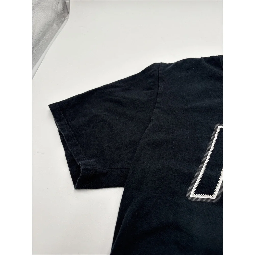 The Nike Tshirt Women's Size Small Raised Log On Front Athletic‎ Cut 100% Cotton